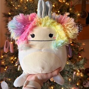 Zaylee the Bigfoot Squishmallow plush with rainbow hair and bunny ears